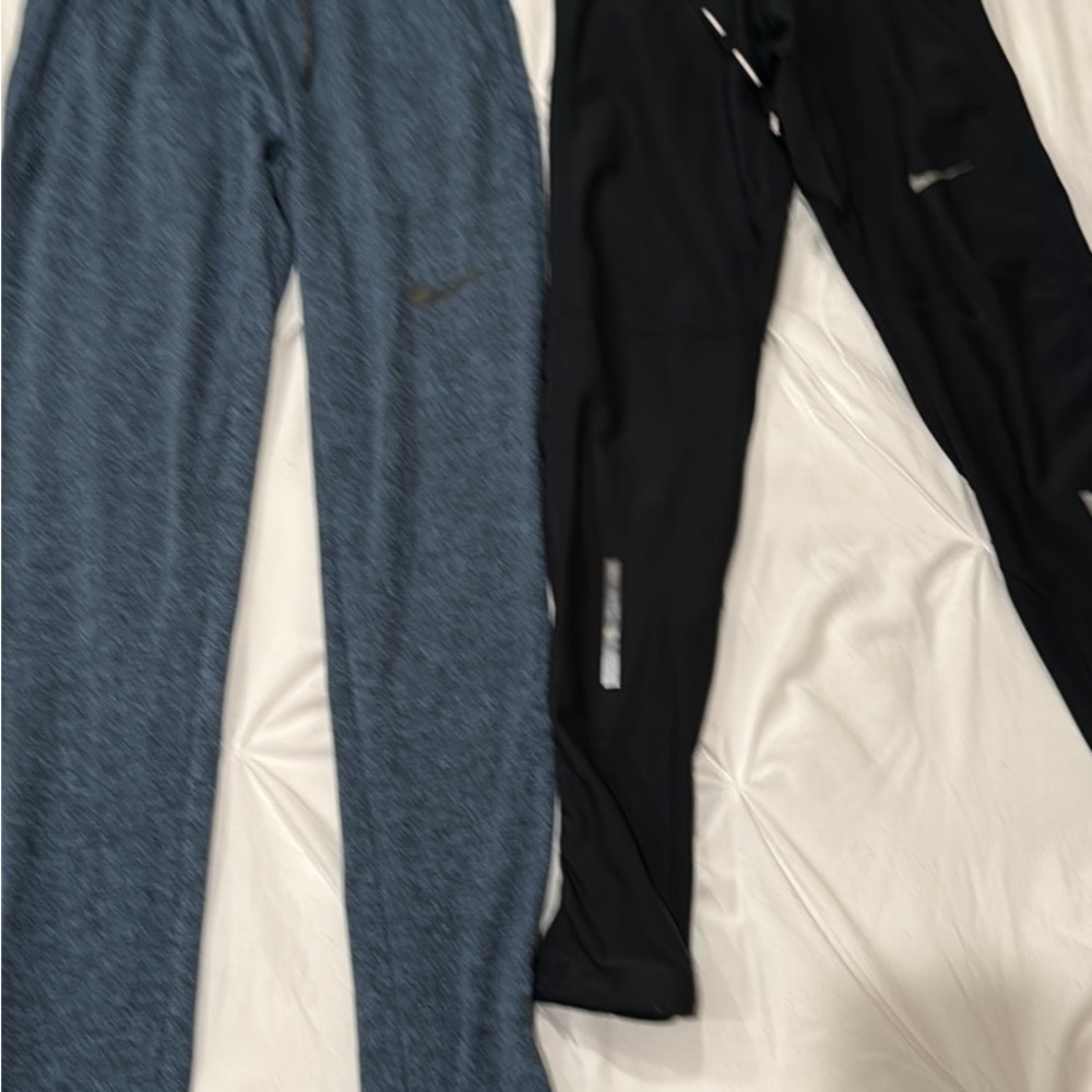 2 pairs of Nike men’s small Black and Blue Athletic Pants